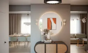 Nowoczesny przedpokój inspiracje ściany: okrągłe lustro z podświetleniem, rattanowa komoda i jadalnia w tle.