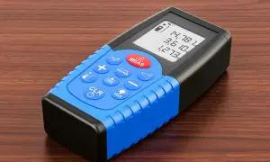Cyfrowy dalmierz co to? Urządzenie z ekranem LCD i przyciskami do pomiaru odległości.