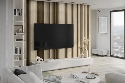 Nowoczesny salon z telewizorem wiszącym na ścianie pokrytej pionowymi lamelami. To właśnie te lamele tworzą unikalny efekt wizualny.