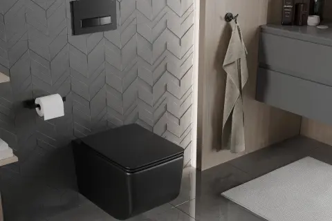 Nowoczesna łazienka z czarnym, podwieszanym WC. Zobacz, jak zamontować stelaż WC i cieszyć się minimalistycznym designem.