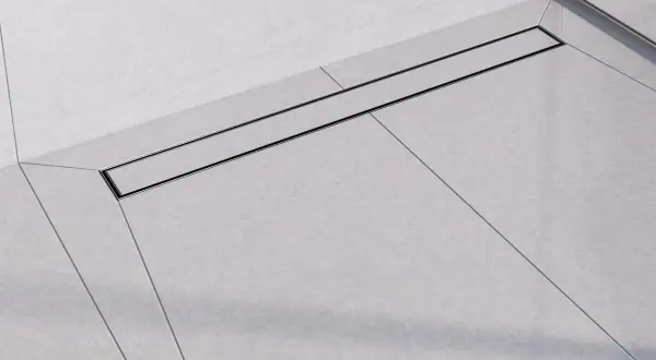 Nowoczesny odpływ liniowy z czarną ramką, idealnie wkomponowany w płytki podłogowe z subtelnymi spadkami.
