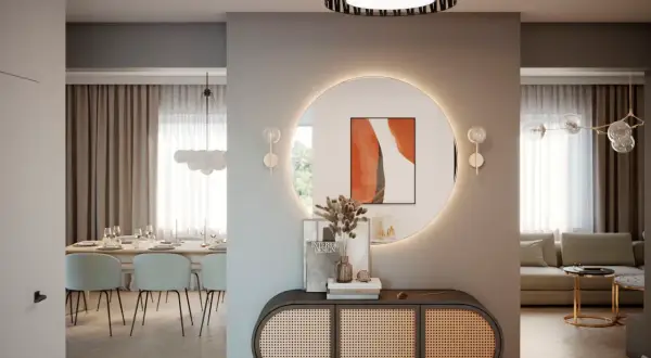 Nowoczesny przedpokój inspiracje ściany: okrągłe lustro z podświetleniem, rattanowa komoda i jadalnia w tle.