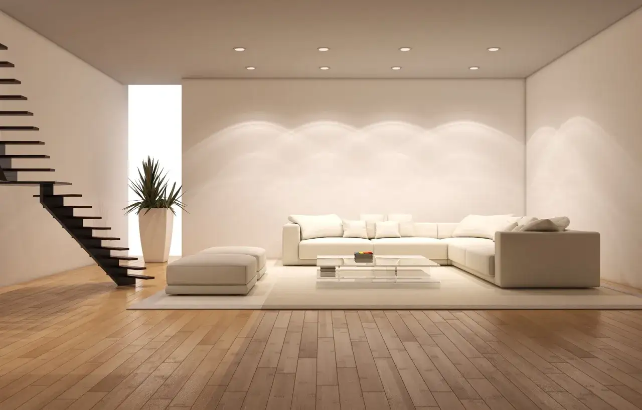 Nowoczesne wnętrze z białymi meblami i schodami. Idealne wykończenie ścian wewnętrznych podkreśla elegancję przestrzeni.